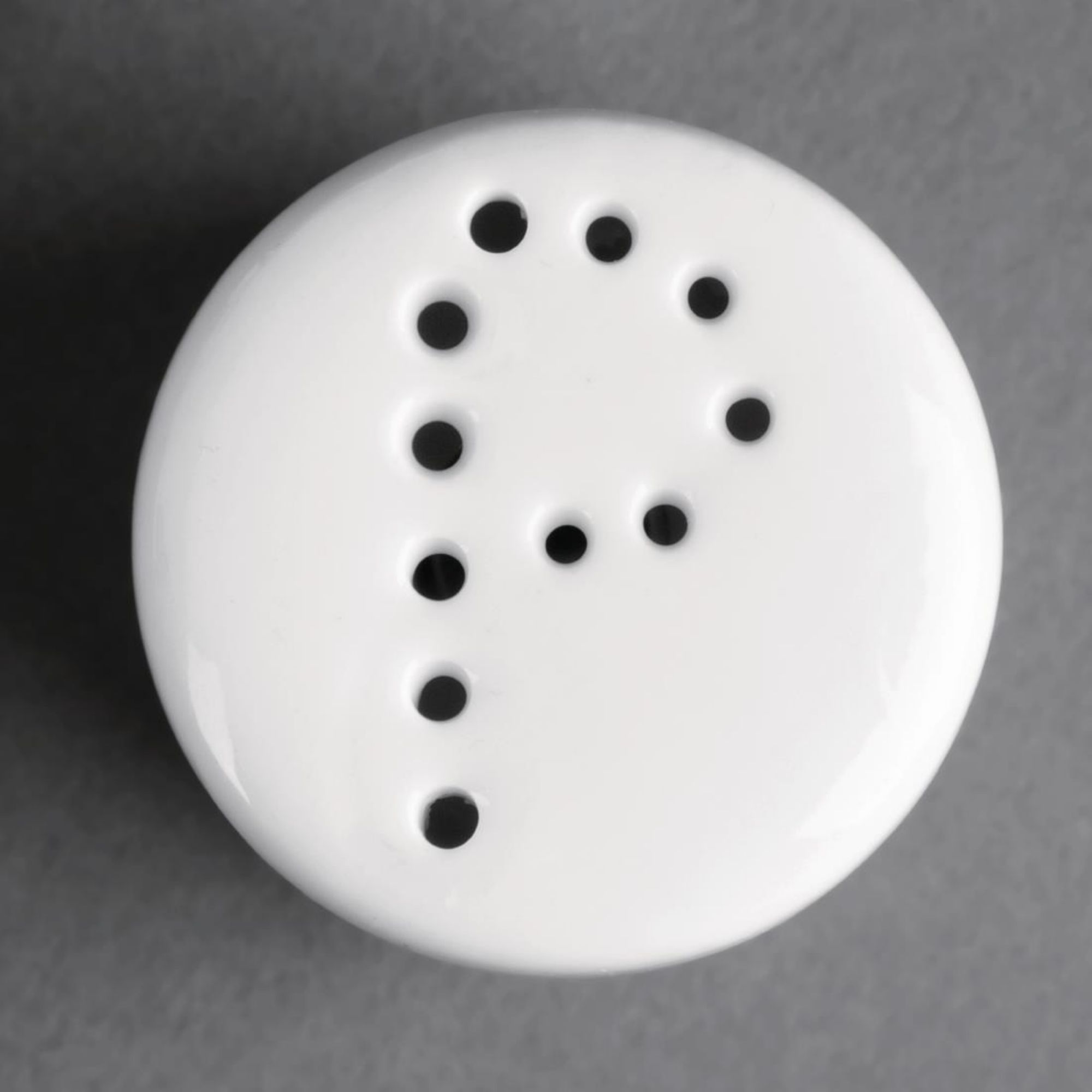 Picture of Olympia Whiteware Pepper Shakers 80mm (Pack of 12)