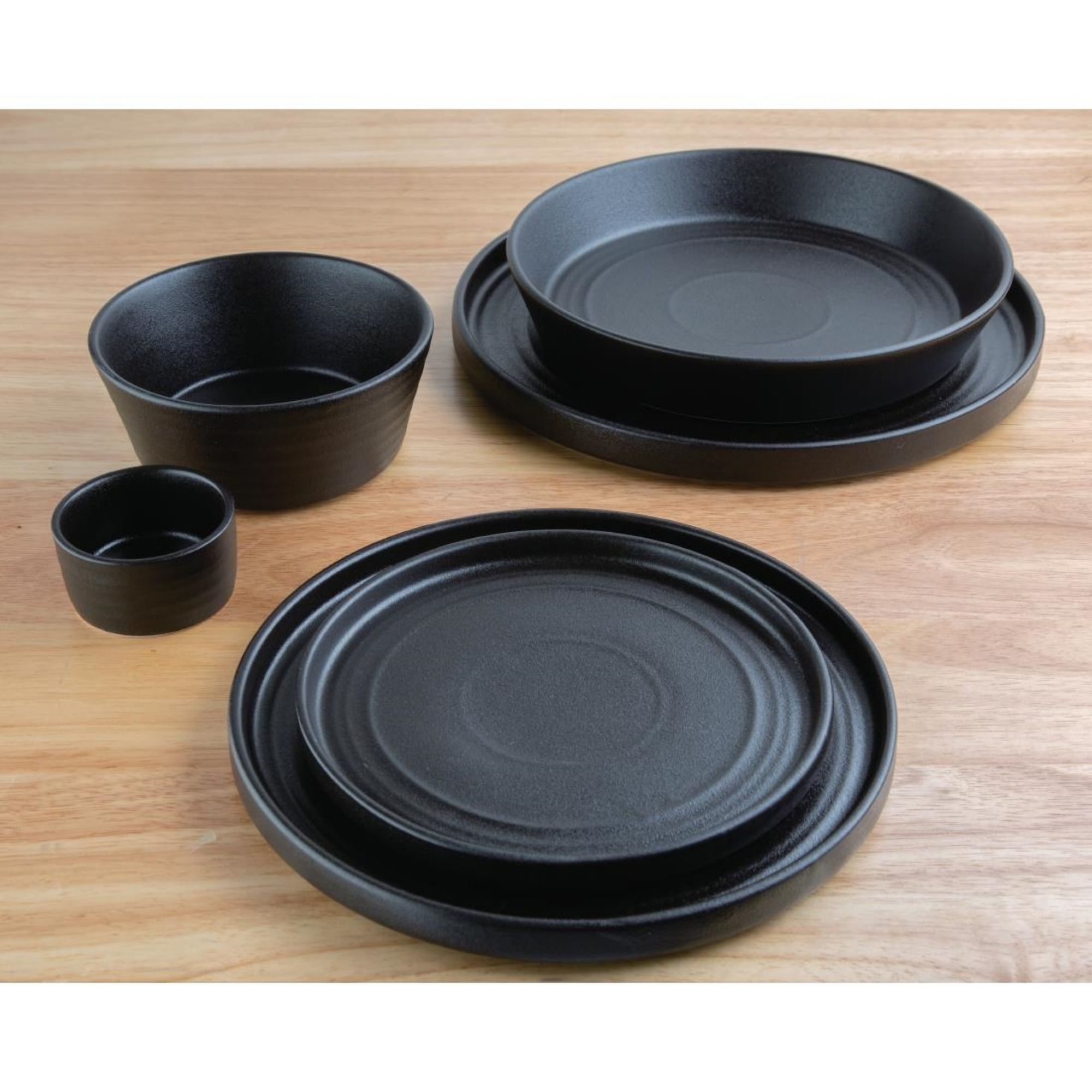 Picture of Olympia Cavolo Flat Round Plates Textured Black 270mm (4 Pack)