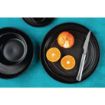 Picture of Olympia Cavolo Flat Round Plates Textured Black 270mm (4 Pack) - FD910